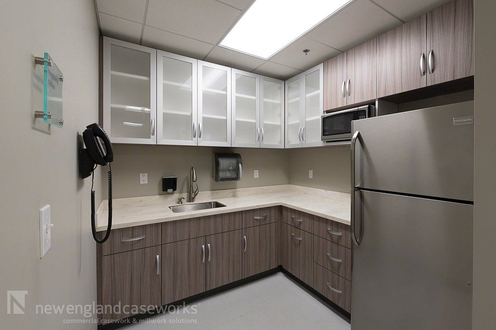 Completed Project New England Lab Conference Center Collaborating with the client NEC provided textured woodgrain plastic laminate commercial cabinets with solid surface tops in the kitchenettes Conference room cabinets a lobby digital signage wall and other millwork features showcase engineered Wenge veneer that provides consistent color and grain throughout the space Check out the project gallery at httpsnewenglandcaseworkscomprojectnew england lab conference center     conferenceroomcabinets plasticlaminate kitchenettes solidsurface wenge engineeredveneer signagewall commercialcasework officecasework slidingmarkerboard architecturaltrim aluminumframed officemillwork coatroom texturedlaminate woodlaminate