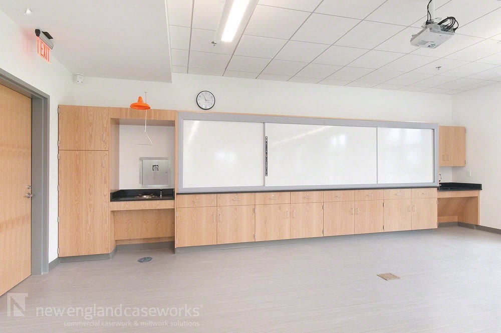 1161531183118167994897476294266877733012332n | New England Caseworks Completed Project stjohnsprep STEM Building Partnering with flansburgharchitects and windover construction NEC provided several configurations of student workstations built from plain sliced White Oak Sliding technology boards were integrated into the teaching wall hiding additional storage Check out the project gallery at httpsnewenglandcaseworkscomprojectst johns prep stem building whiteoak educationalcabinets woodcabinets educationalcasework workstations teachingwall STEM teachingcabinets prepschoolcabinets educationalmillwork epoxyresin mailboxunit