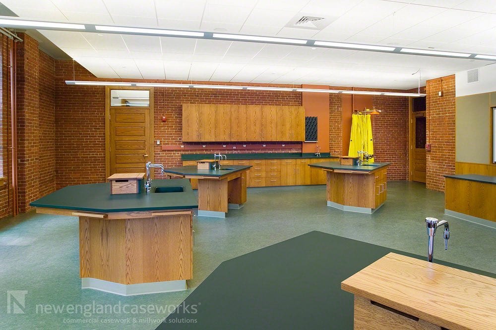 Completed Project worcesteracademy Kingsley Hall in Worcester MA Partnering with annbehaarch and consigliconstruction NEC built custom hexagonal student workstations Each Plain Sliced Red Oak bench features five epoxy pullout writing surfaces as well as a wire management box to hide laptop wire clutter Vented chemical storage cabinets and mobile prep stations were also manufactured for the private school Check out the project gallery at httpsnewenglandcaseworkscomprojectworcester academy kingsley hall privateschool woodveneercasework redoak epoxytops studentworkstations chemicalstorage educationcasework educationmillwork educationallabs mobileprepstations woodcabinets wiremanagement pullouttablets blog Commercial Casework and Cabinets